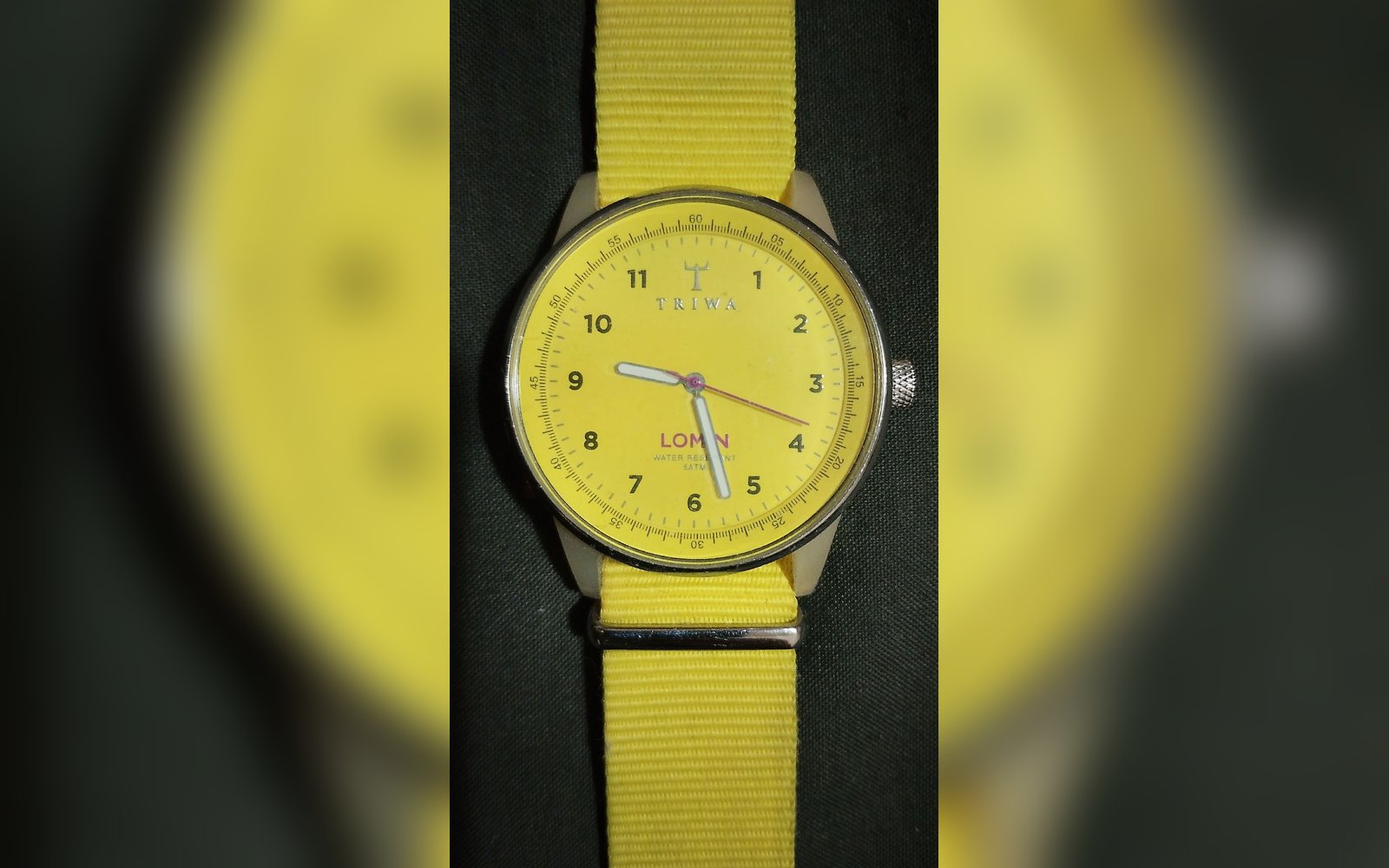 ساعة Triwa Yellow Lomin (موديل LOAC106) .